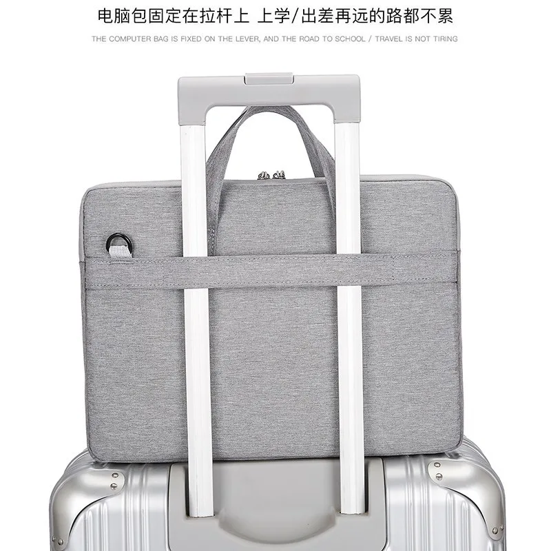 Model 162 laptop bag attached to suitcase handle with rear luggage strap for travel