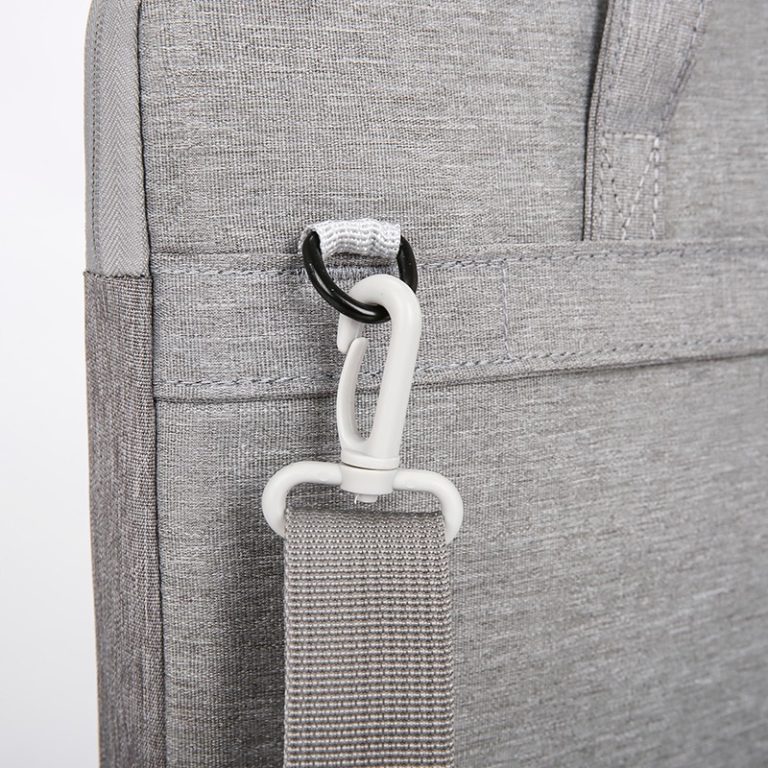 Close-up of the detachable shoulder strap hardware on Model 162 laptop briefcase bag