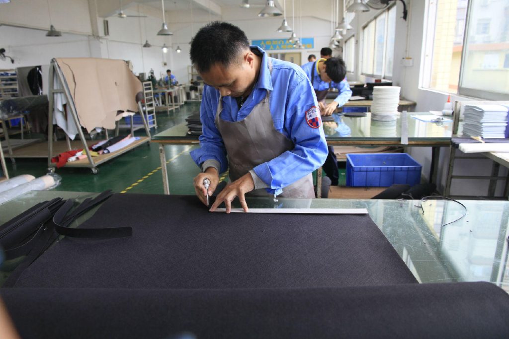 Leather cutting workshop at our briefcase manufacturing factory