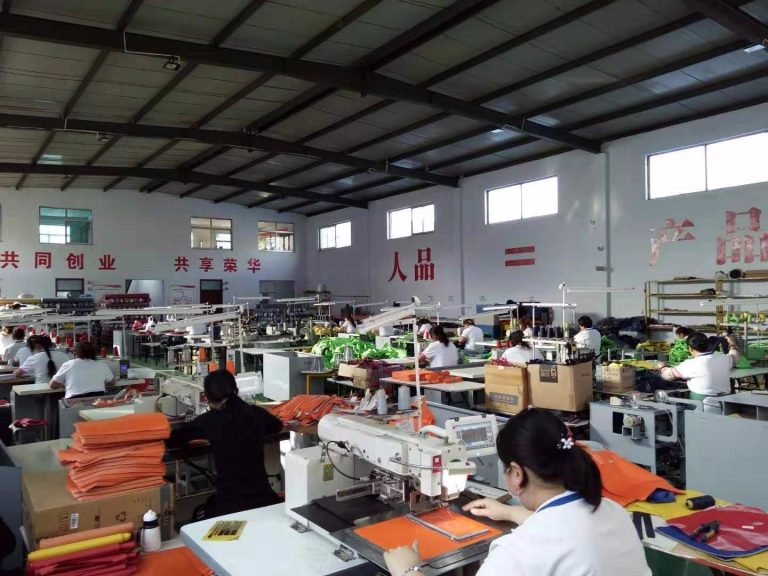 Bag manufacturer workshop assembling private label briefcases