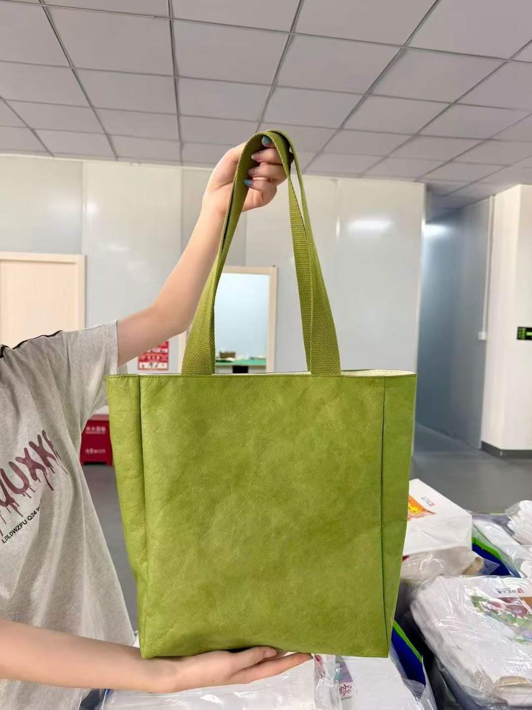Custom DuPont Paper Tote Bag - Canvas-Lined, 4 Colors 1 DuPont paper tote bag in olive green with canvas handles