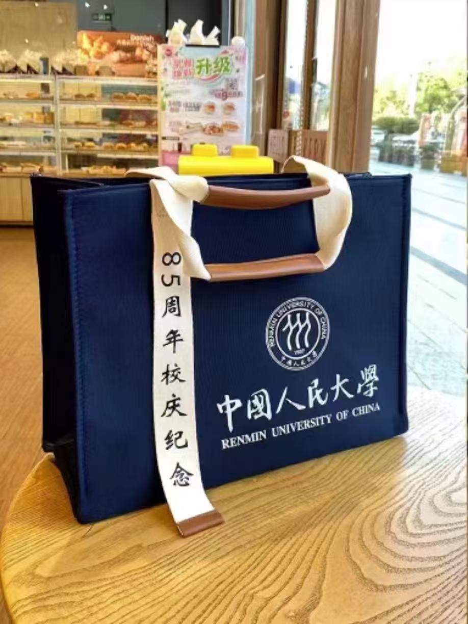 Custom Navy Oxford Tote Bag with Detachable Shoulder Strap 3 Navy oxford tote bag printed with a custom university anniversary logo